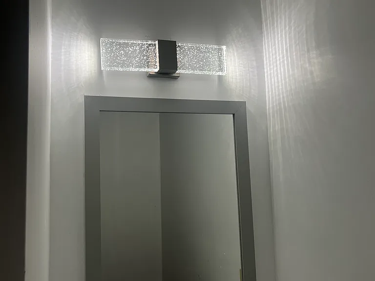 Beautiful brand new vanity light.