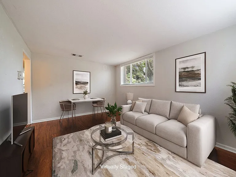 Living room with lots of East and Southern light (virtually staged)