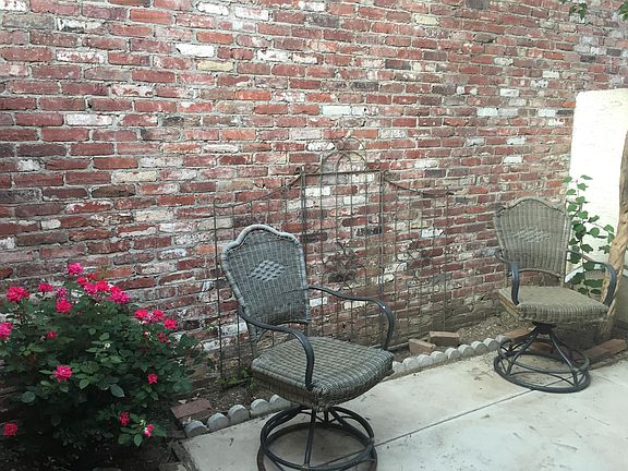 Cute and private rear yard, including natural gas Weber grill.