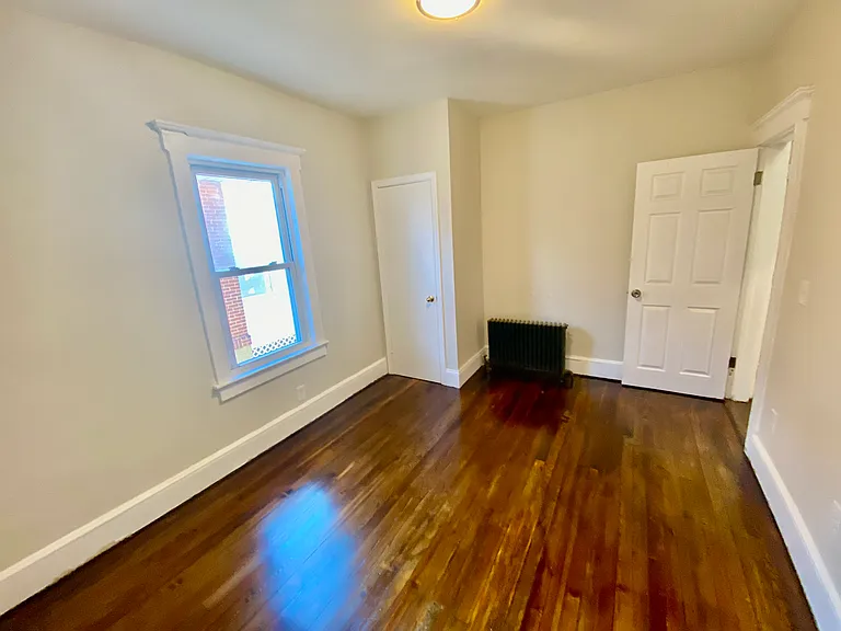 (first floor) bedroom, can fit any size bed, hardwood floor, high ceilings, LED light. 10x 12