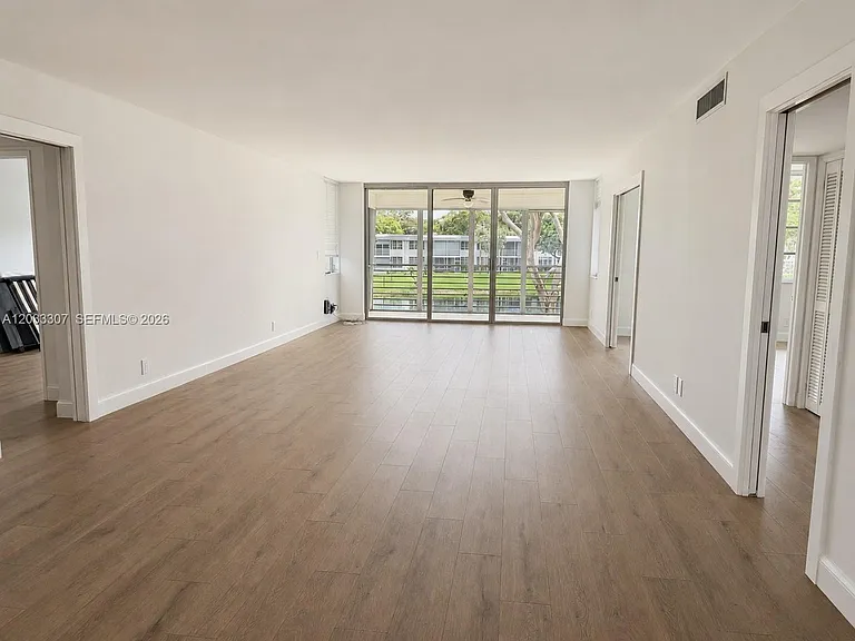 4261 W Palm Aire Dr #202 — Photo 2