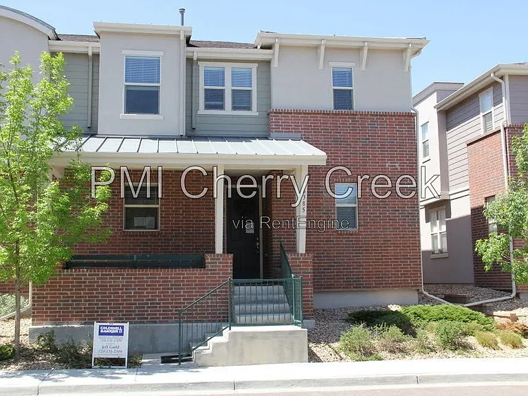 6385 S Xanadu Way — Photo 1