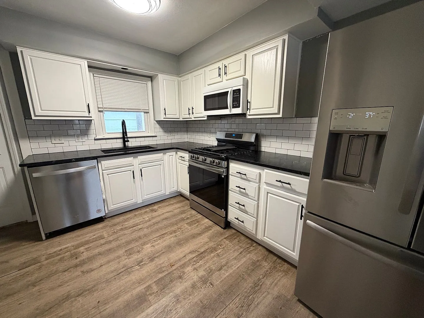 Spacious 4-Bedroom Home with First-Floor Convenience and Great Outdoor Space — Photo 1