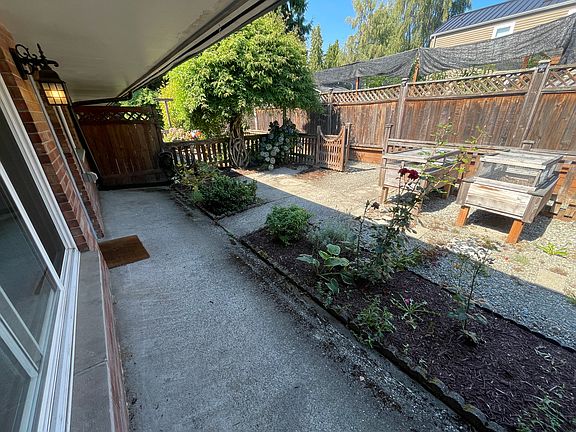 Unit exterior and private yard.