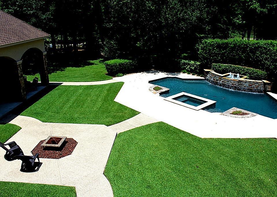 Balcony view of fire pit and this gorgeous back yard!