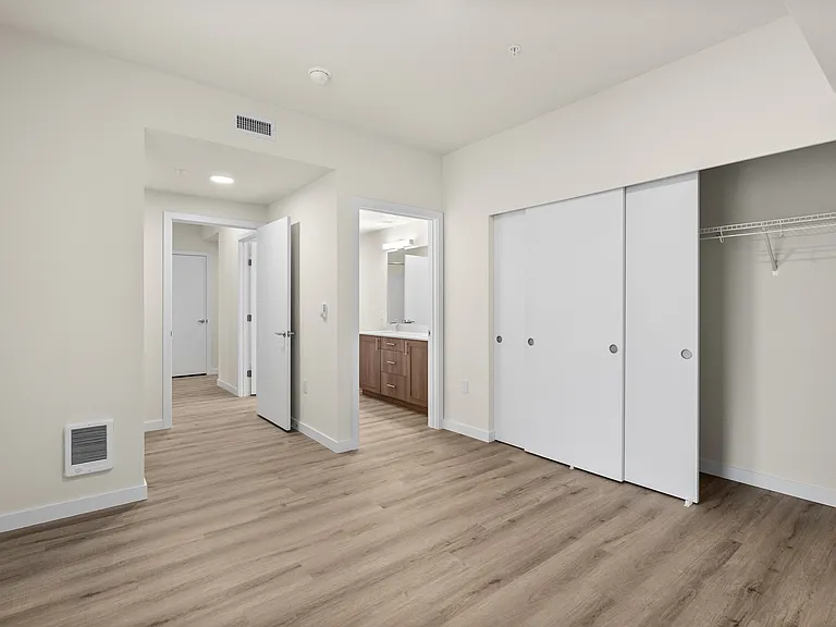 Spacious bedroom with ample closet space. Spacious bedroom with ample closet space.