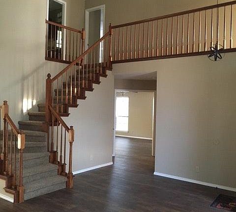 Stairway off living room.