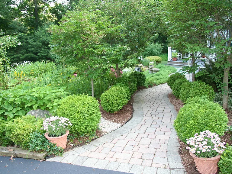 Wave walkway to nearby garden cottage.