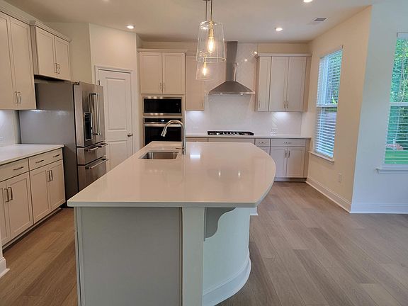 SS appliances, large island, lots of windows