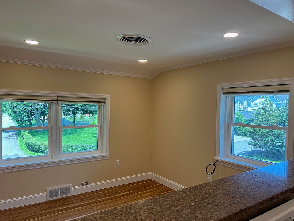 Front facing living room in quiet residential neighborhood