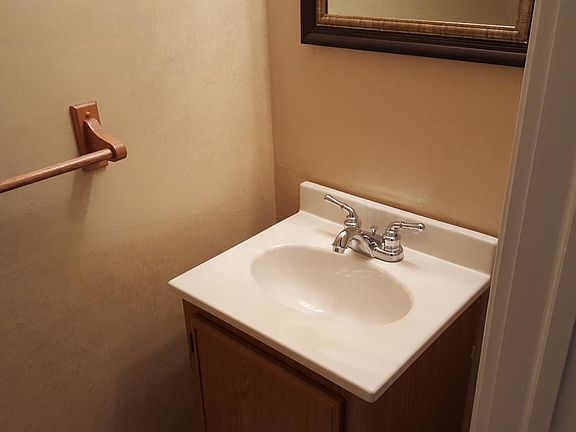 1st floor half bath sink - new faucet.