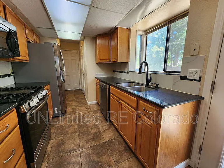 10833 W Patterson Pl — Photo 2
