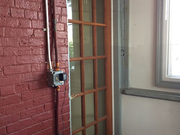 entrance to apartment off of porch