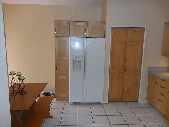 Pull out storage by Fridge