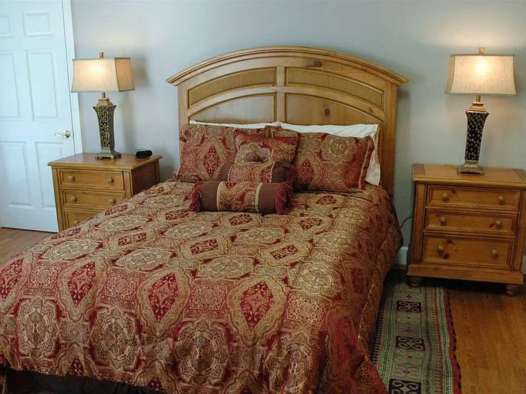 Bedroom #3 with Queen bed and doorway to toe to toe bonus room