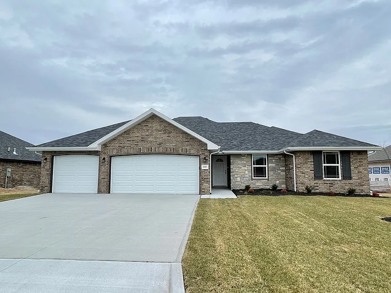 6002 S Iris Ln — Photo 1