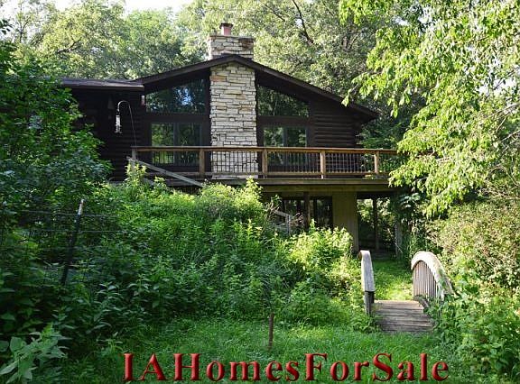 Secluded Wooded Lot.  Drive-thru driveway. 