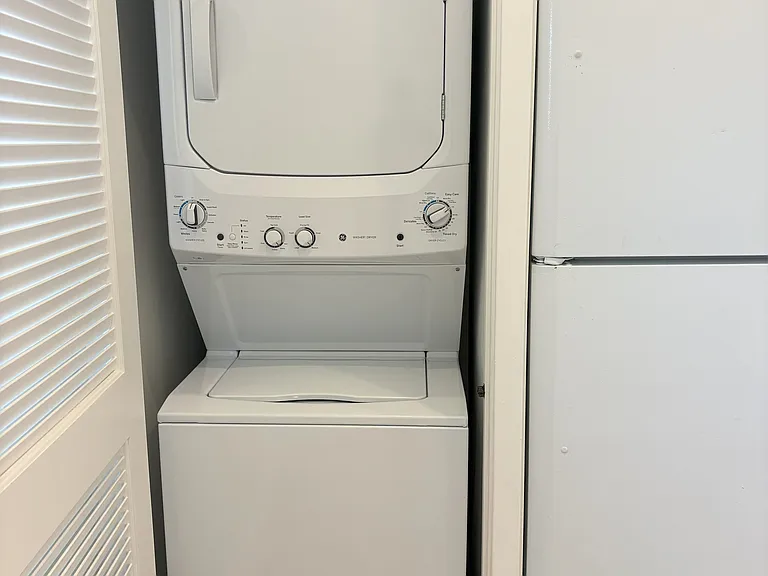 Laundry room includes a combo washer/dryer