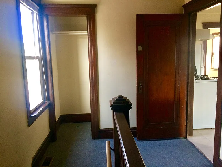 Entry foyer with coat closet.