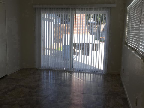 Sliding door access to backyard from master suite.