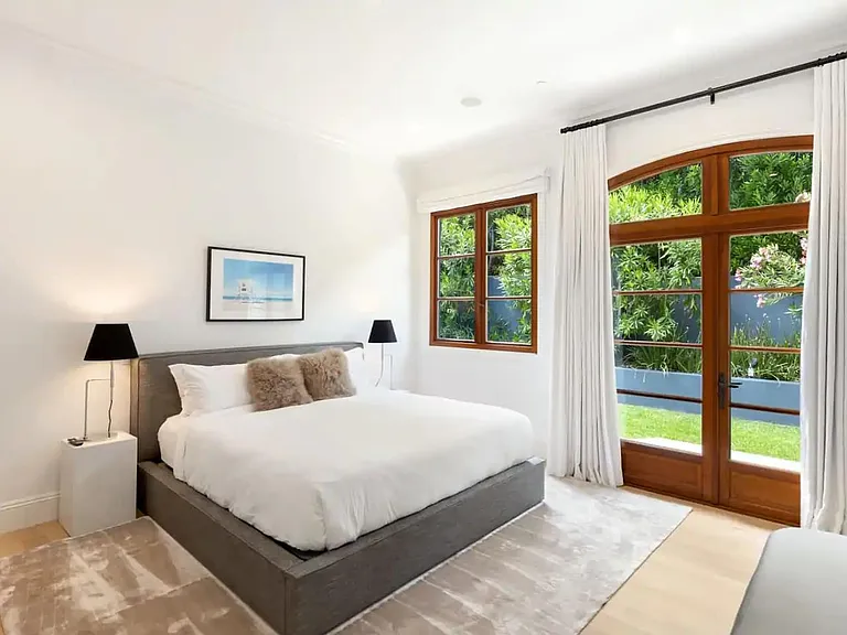 Guest bedroom 1 with tall ceilings