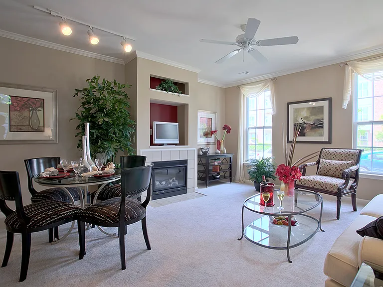 Townhome living area with fireplace (staged)