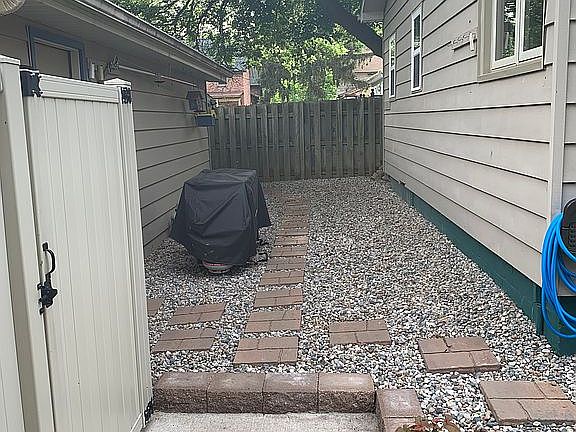 Between house and garage 