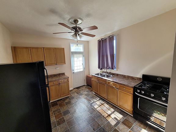 Kitchen with access to rear deck