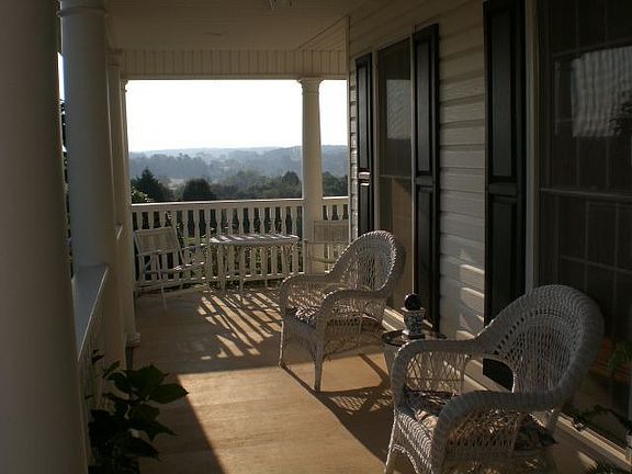 Enjoy Sunsets from Wrap-around Porch