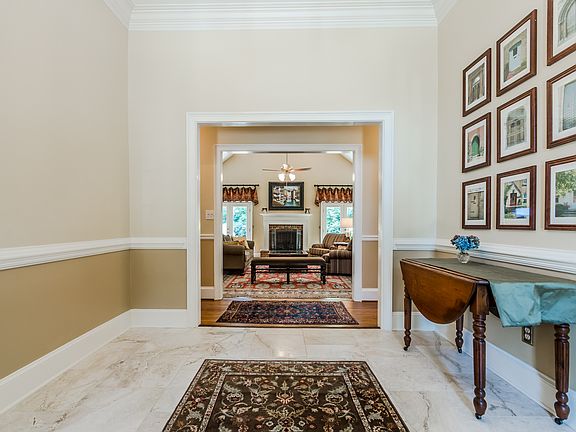 Foyer with travertine tile