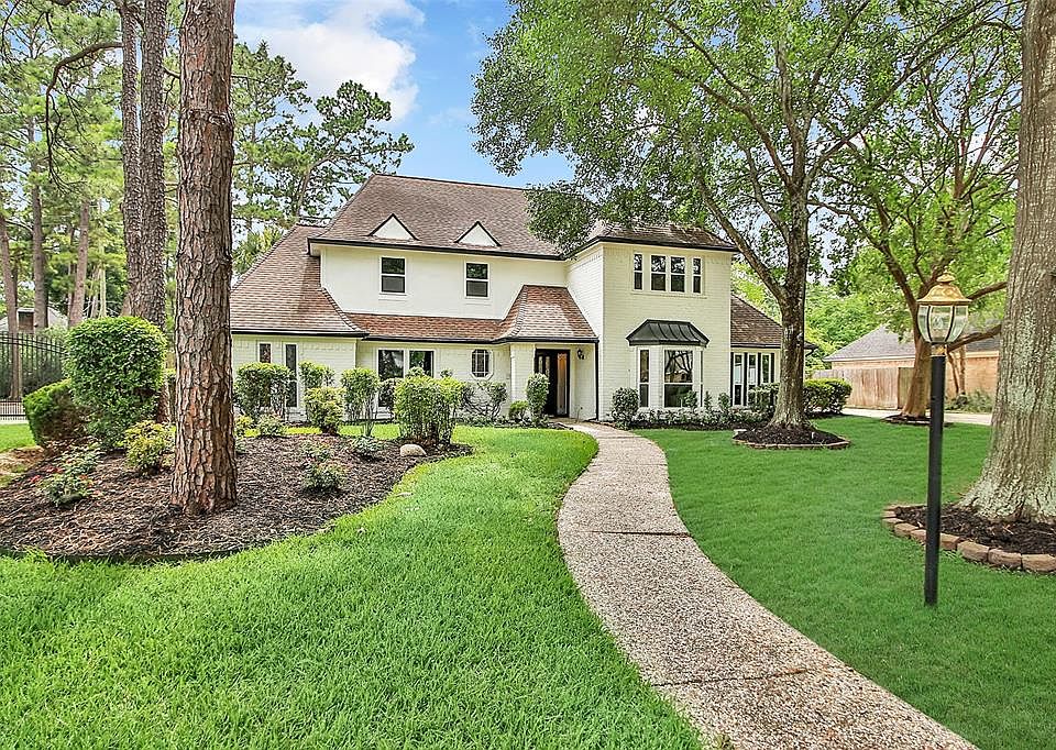 A NEW STAR IN THE NEIGHBORHOOD: Thoughtful updates to the exterior of this home have given it a striking presence on this large lot. Newly painted brick has given the house a light and bright look, and new double-pane windows have amped up the curb a