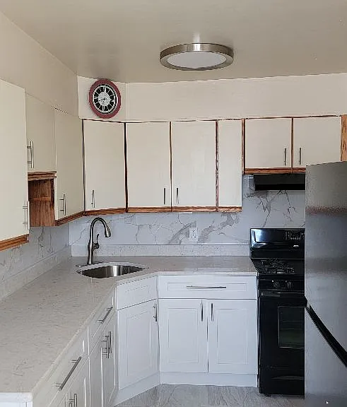 7703 Woolston Ave #1 — Photo 3