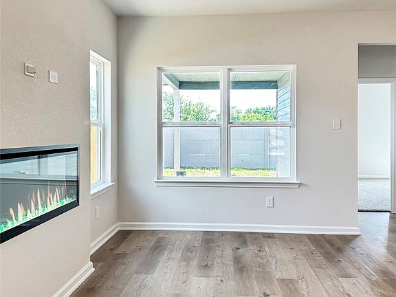 The Oakshire II- Family Room with Electric Fireplace.
