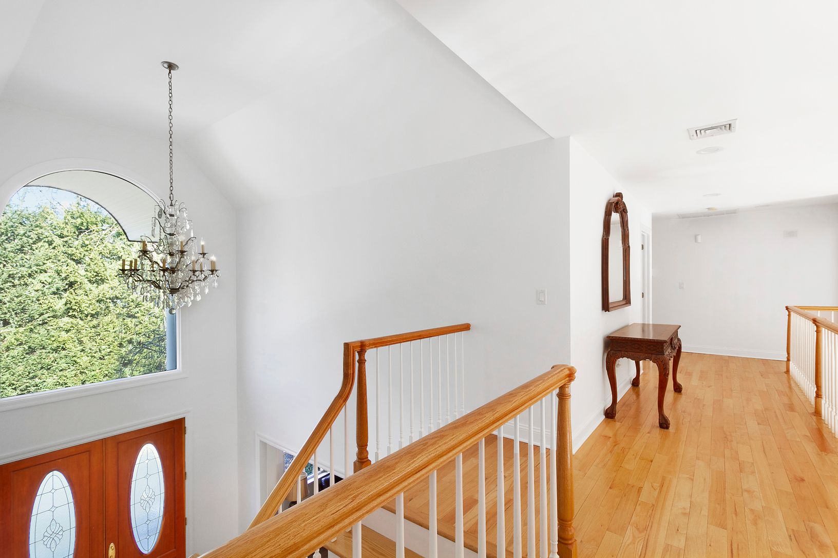  Light Filled Balcony and Hall Overlooking Living Room and Entry