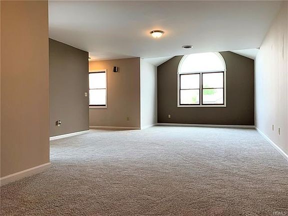 Living room, with lovely colors and new carpet!