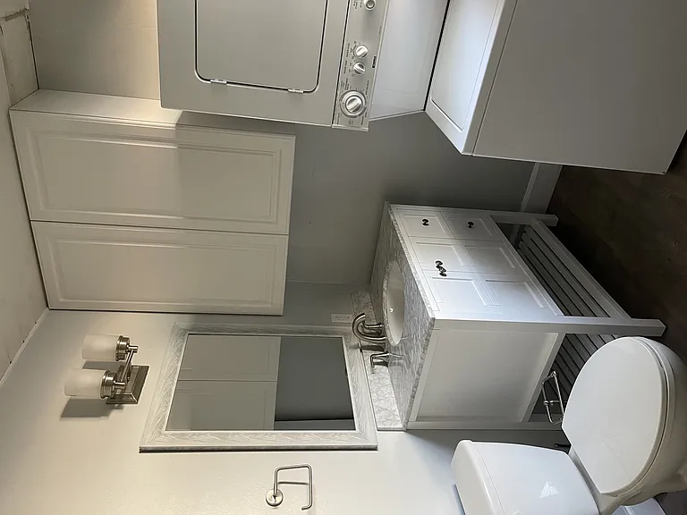 New bathroom with washer n dryer