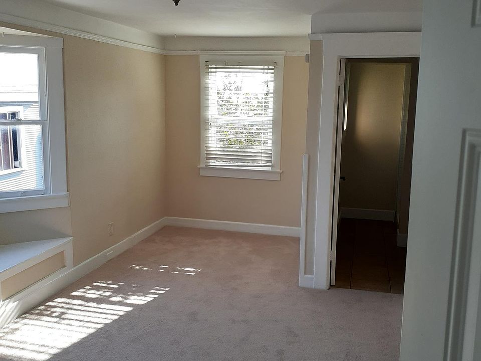 Living room and door to bath