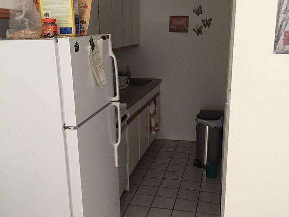 The hallway and kitchen