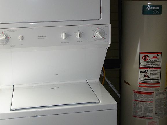 new stackable dryer and washier with new gas water heater