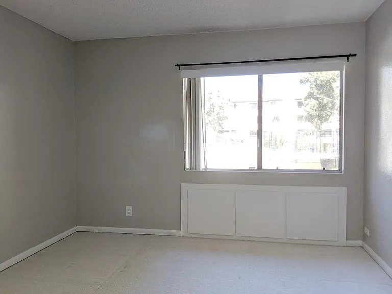 Bedroom 1 with view to the pool