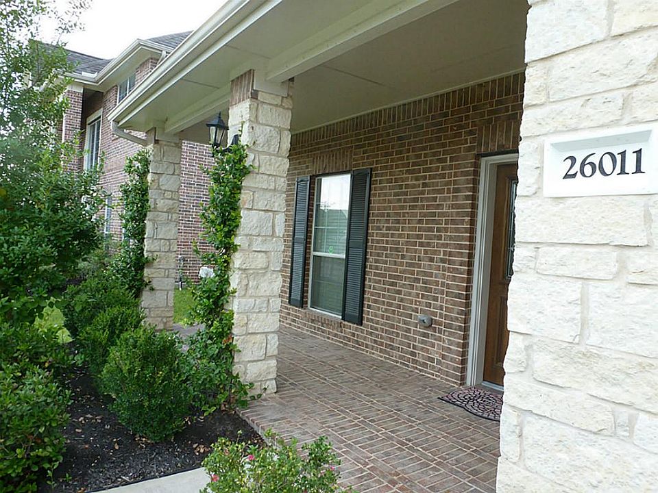 Beautiful front porch elevation with stone accent.