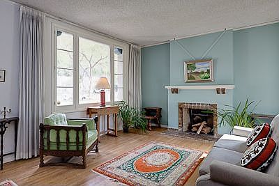 Living room with Batchelder tile filrplace