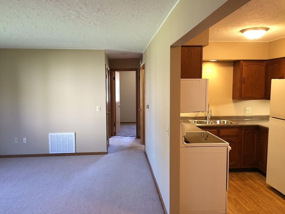 Living room & kitchen, bedrooms/bathroom down the hallway.