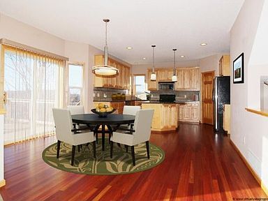 Kitchen Dinette is spacious and has Cherry wood floors