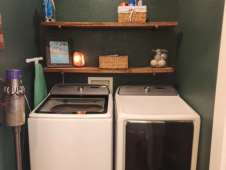 Laundry Room with new Samsung electric washer and dryer