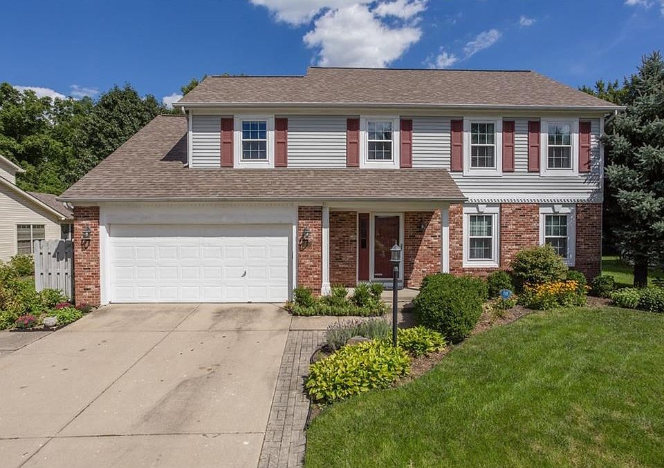 Half a block from Monon Center and ON THE TRAIL but kept private with security fence and tree row!  Newer roof, HVAC, exterior and interior paint, windows and more in this special home for the active family.
