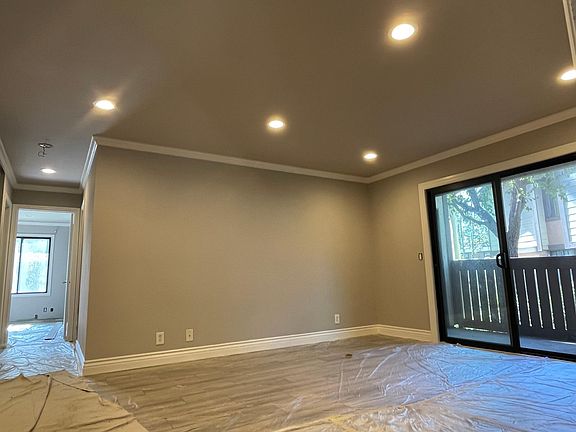 living area from front door area - lights are on dimmer switch