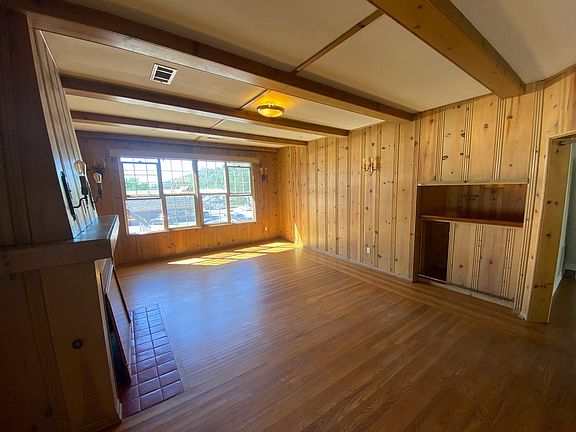 Large living room, origional wood floors throughout