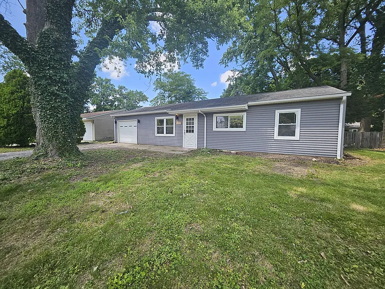 View from the street of 2804 Lawndale, in the quiet Holiday Park neigborhood in west Champaign. 2 blocks from shopping, 2 miles from campus, on the bus line.