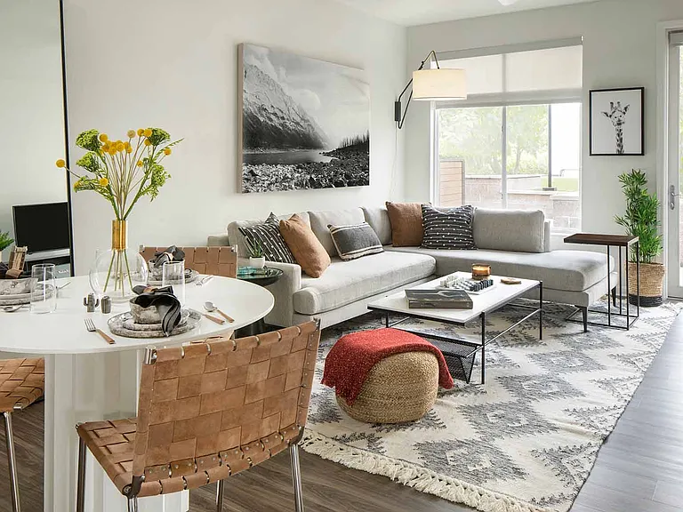 Apartment Living Room and dining space with wood floors.
